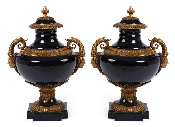 Appraisal: A pair of Empire style gilt bronze mounted blue porcelain