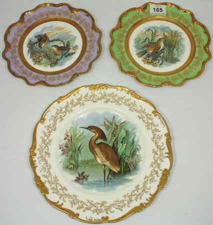 Appraisal: Coalport Heron Plate and a Smaller Pair depicting a Wren