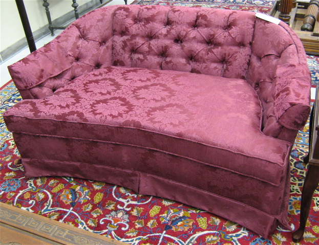 Appraisal: MODERN BURGUNDY LOVESEAT with low buttoned back and overall floral