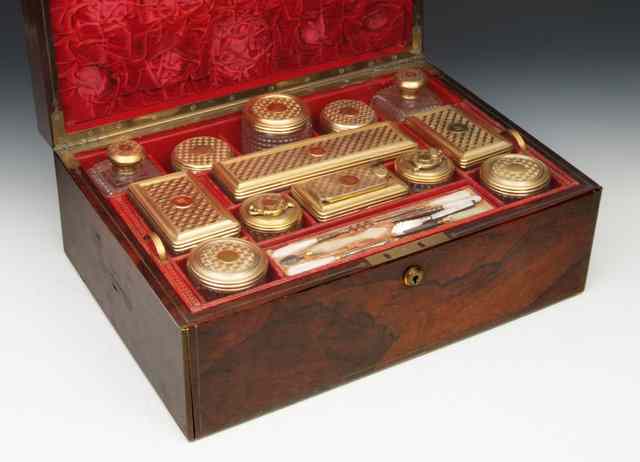 Appraisal: A GEORGE IV ROSEWOOD TRAVELLING DRESSING CASE with brass mounted