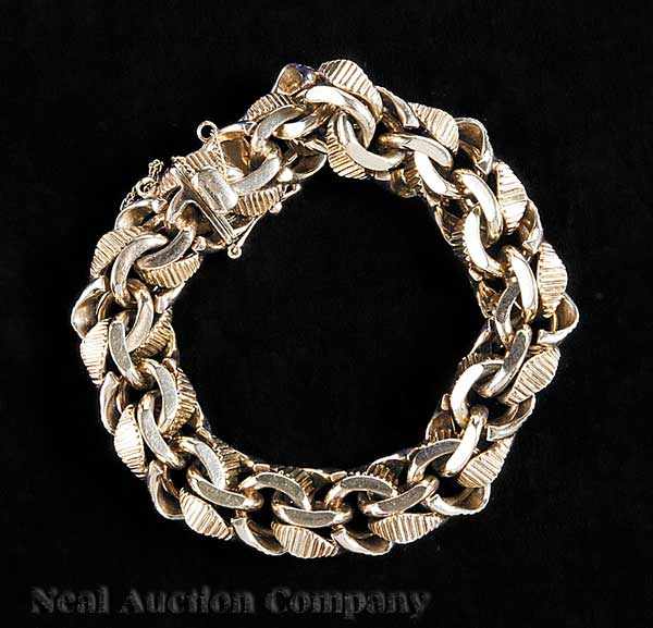 Appraisal: A kt Yellow Gold Link Bracelet with polished and incised