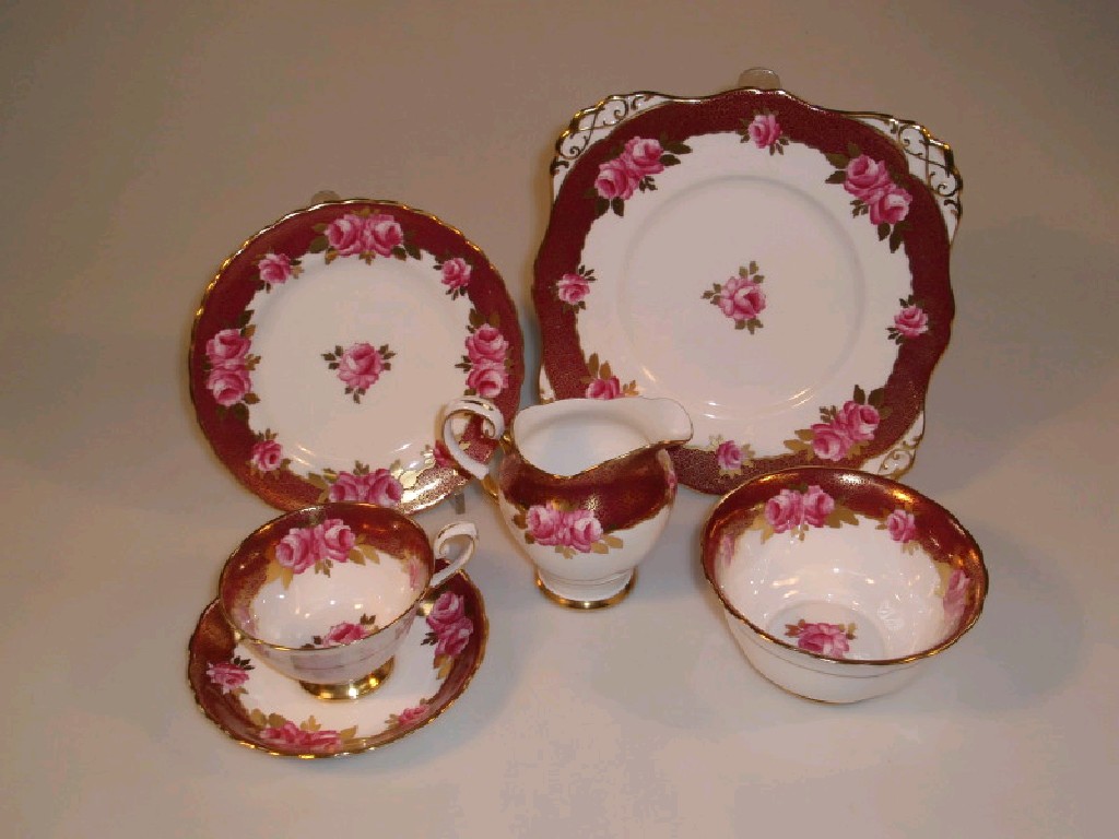 Appraisal: A Tuscan china tea service with rose bud decoration and