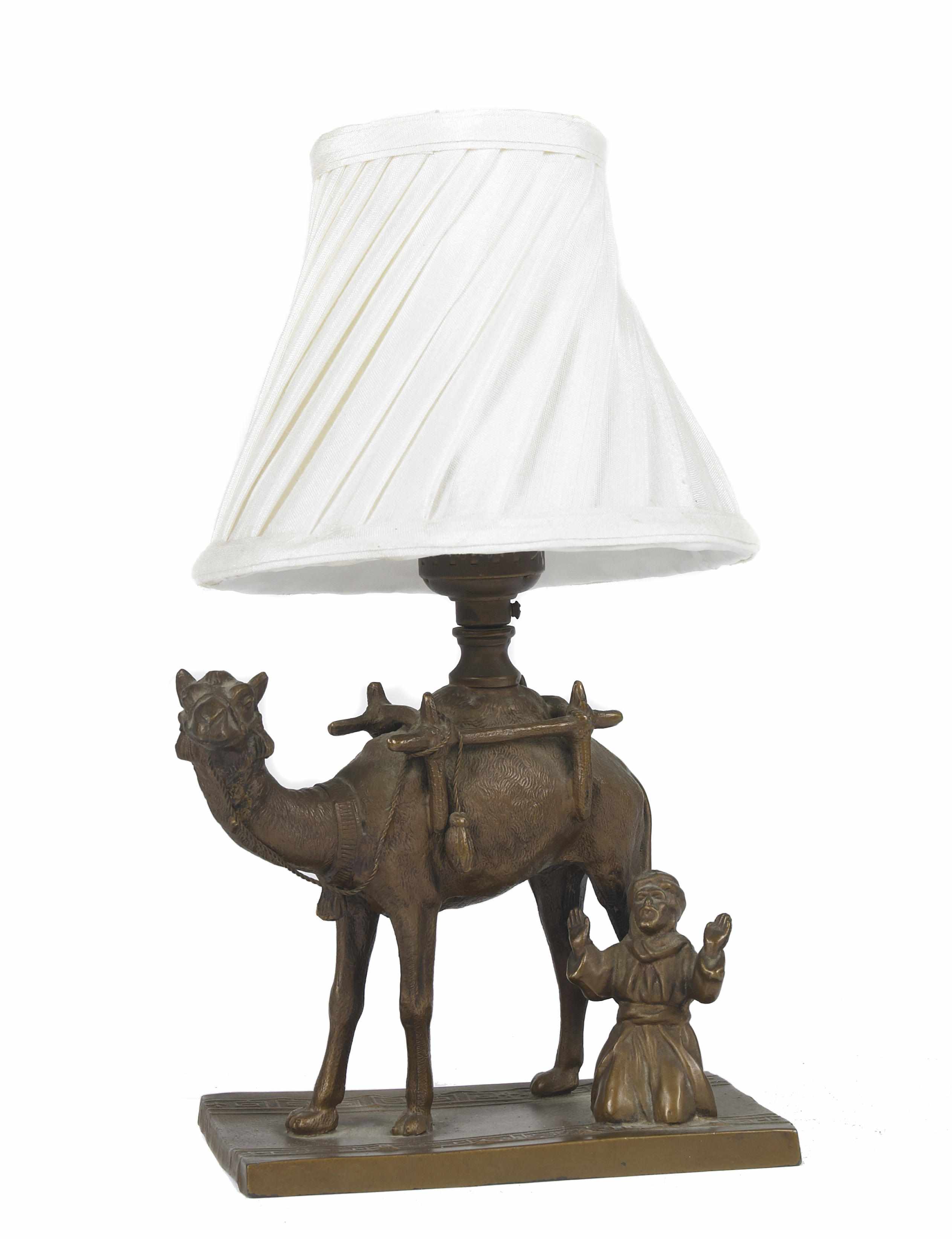 Appraisal: An Orientalist cast bronze camel form table lamp early th