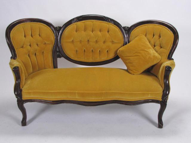 Appraisal: Reproduction Victorian style settee with tufted gold upholstery finger carved