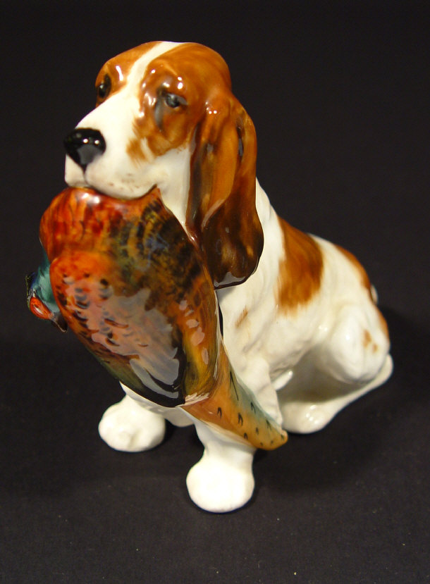 Appraisal: Royal Doulton hunting dog and prey with hand painted decoration