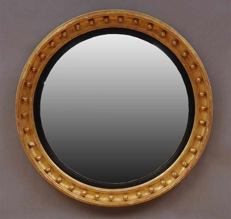 Appraisal: REGENCY CARVED GILTWOOD LARGE CONVEX MIRROR The plate within a