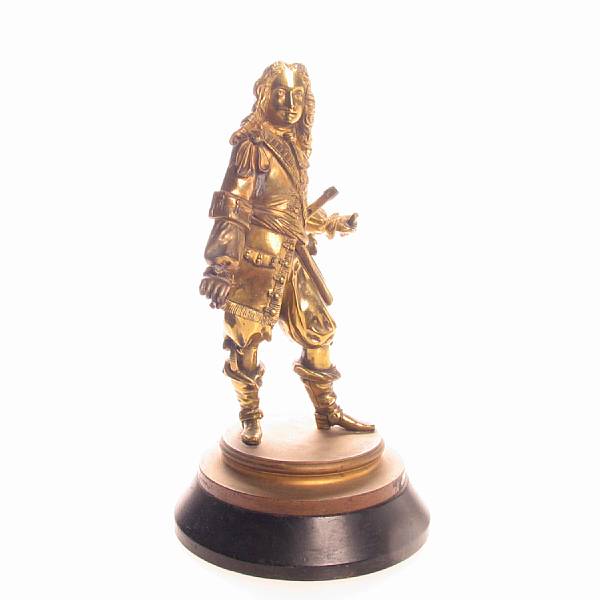 Appraisal: A gilt metal figure of a young man height in