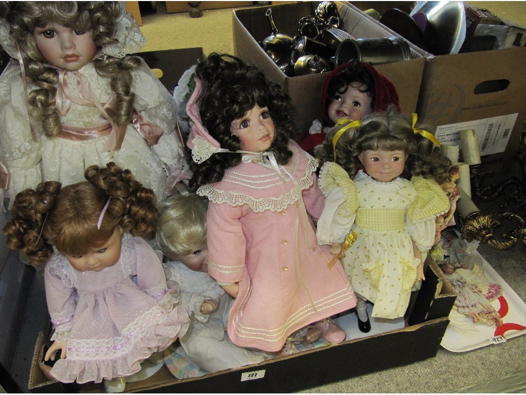 Appraisal: Seven porcelain dolls and angel ornaments boxes available