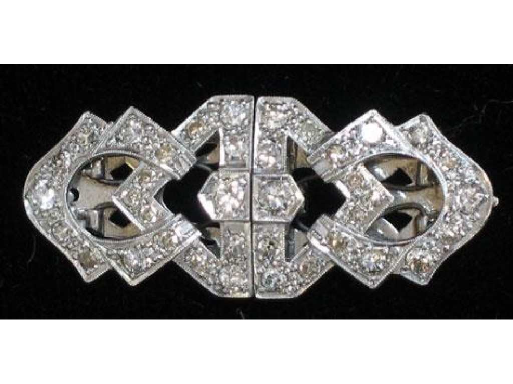 Appraisal: AN ART DECO STYLE DIAMOND DOUBLE CLIP BROOCH in the