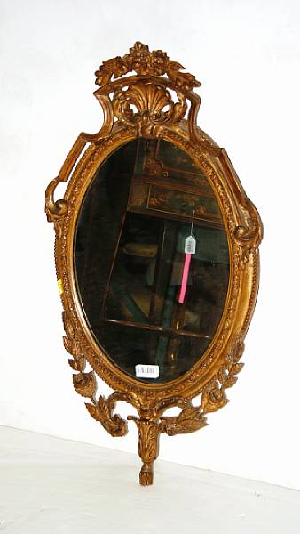 Appraisal: A Rococo style molded composition mirror height in width in