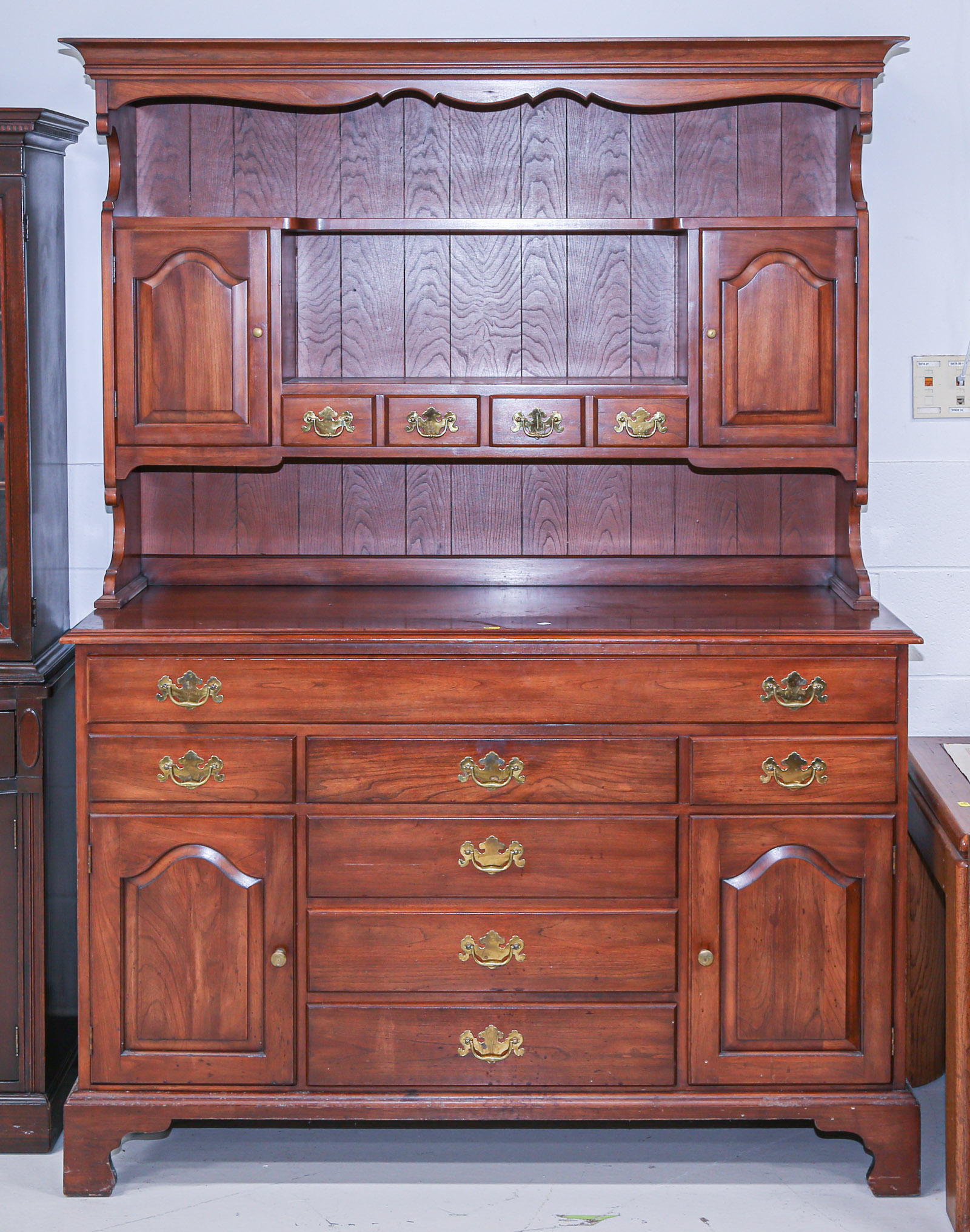 Appraisal: HENKEL HARRIS CHERRY HUTCH CABINET Later th century made in