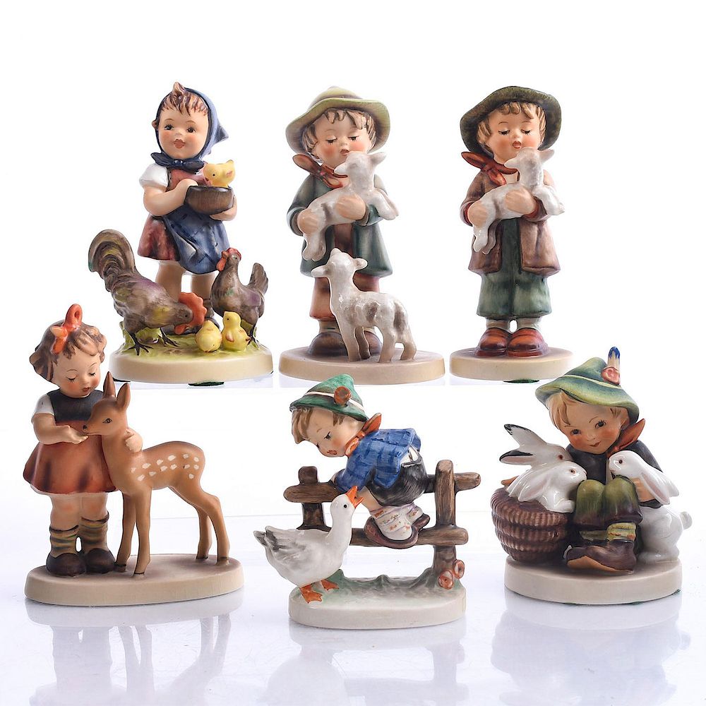 Appraisal: GOEBEL HUMMEL FIGURINES CHILDREN ANIMALS Bisque porcelain children with lambs