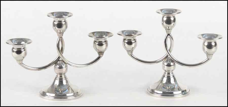 Appraisal: PAIR OF REVERE SILVERSMITHS WEIGHTED STERLING SILVER THREE-LIGHT CANDELABRA ''