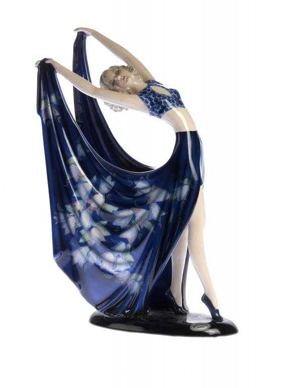 Appraisal: A GOLDSCHEIDER EARTHENWARE FIGURE OF A DANCER MODELLED BY STEPHAN