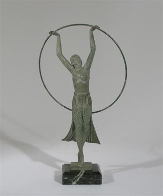 Appraisal: A verdi gris bronze figure of a hoop dancer cast