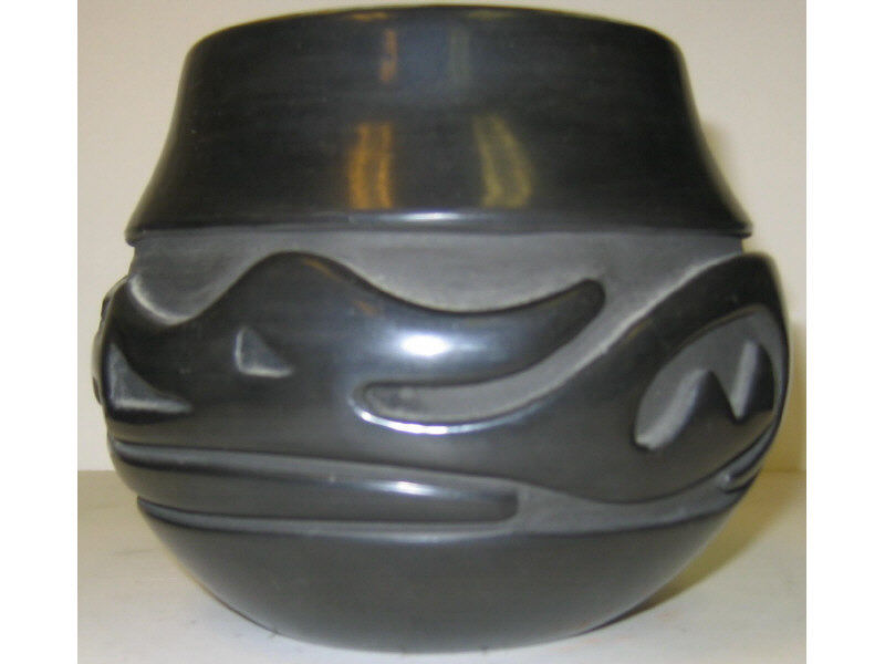 Appraisal: STELLA CHAVARRIA Santa Clara Blackware bowl with carved avanyu design