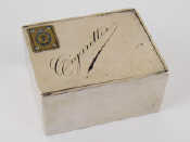 Appraisal: A silver plated cigarette box with sliding lid inlaid with