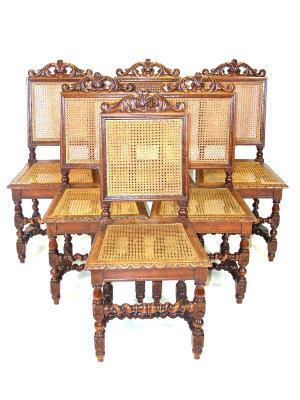 Appraisal: Six French oak dining chairs circa the foliate carved crest