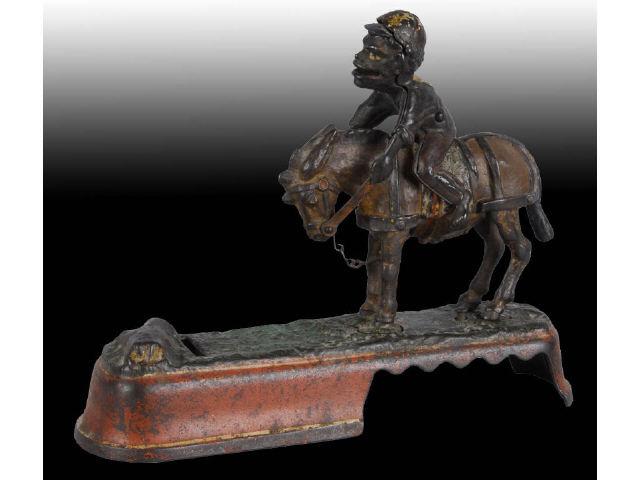 Appraisal: Cast Iron Spise a Mule Mechanical Bank Description Jockey over