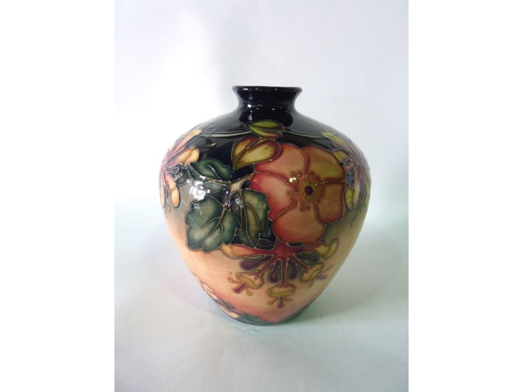 Appraisal: A Moorcroft vase of shouldered form with dog rose and