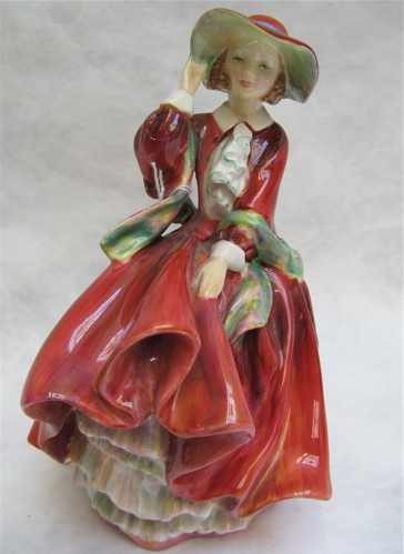 Appraisal: AN ENGLISH ROYAL DOULTON GLAZED FIGURE Top o' the Hill