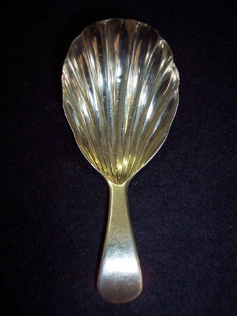 Appraisal: A George III caddy spoon with shell bowl