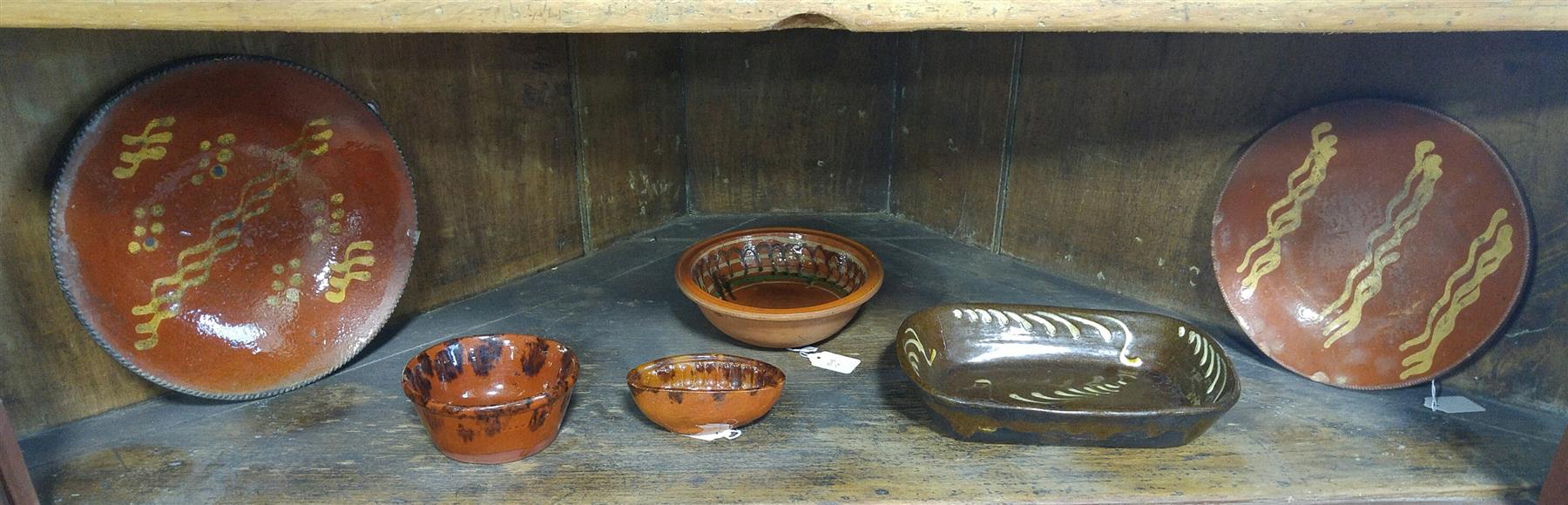 Appraisal: SIX PIECES OF REDWARE Mid th century Four pieces with