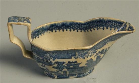 Appraisal: Pearlware blue and white sauceboat early th century with printed