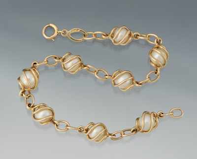 Appraisal: A Ladies' Gold and Pearl Bracelet k yellow gold bracelet