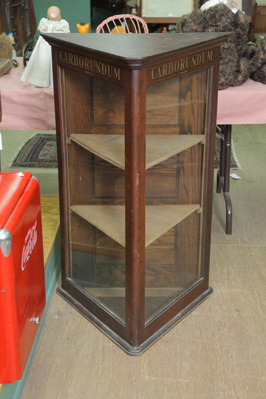 Appraisal: STORE DISPLAY CASE ''Carborundum'' display case Oak of triangular form