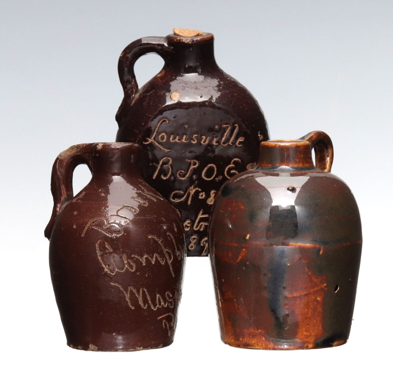 Appraisal: THREE FRATERNAL ORGANIZATION STONEWARE MINI JUGS