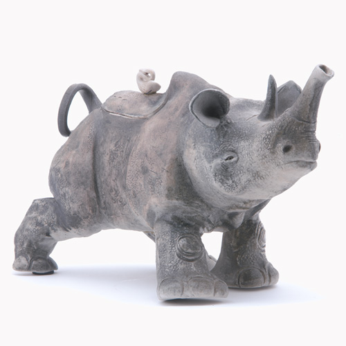 Appraisal: NATALIE SURVINO Staten Island NY Whimsical porcelain rhinoceros figural teapot