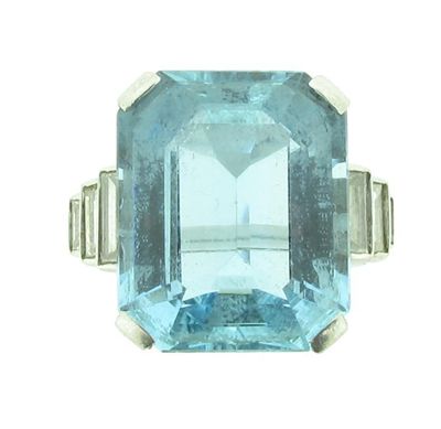 Appraisal: An aquamarine and diamond ring The emerald cut aquamarine weighs