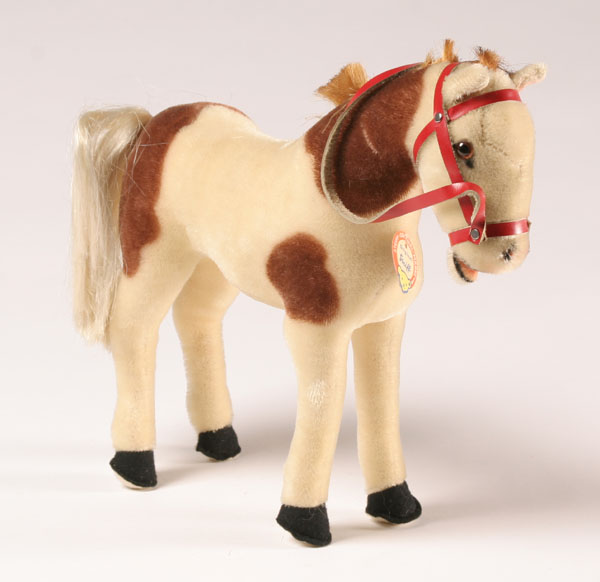 Appraisal: Vintage Steiff toy pinto horse with bridle ear button paper