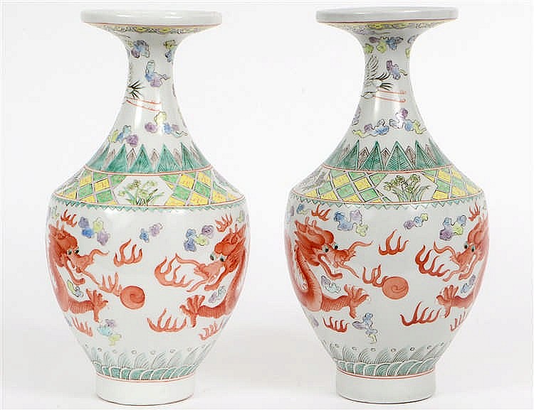 Appraisal: PAIR OF CHINESE ENAMEL DECORATED PORCELAIN VASESEach with a four-character