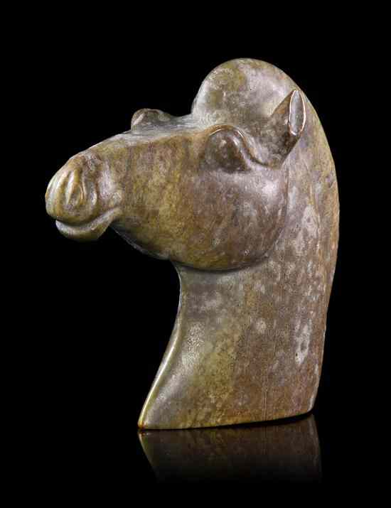 Appraisal: A Chinese Nephrite Jade Horse Head Han Dynasty the stone