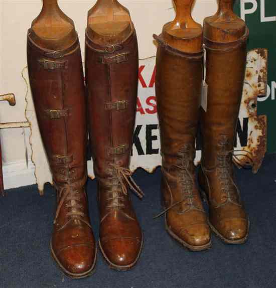 Appraisal: Two pairs of tan leather riding boots with wooden trees