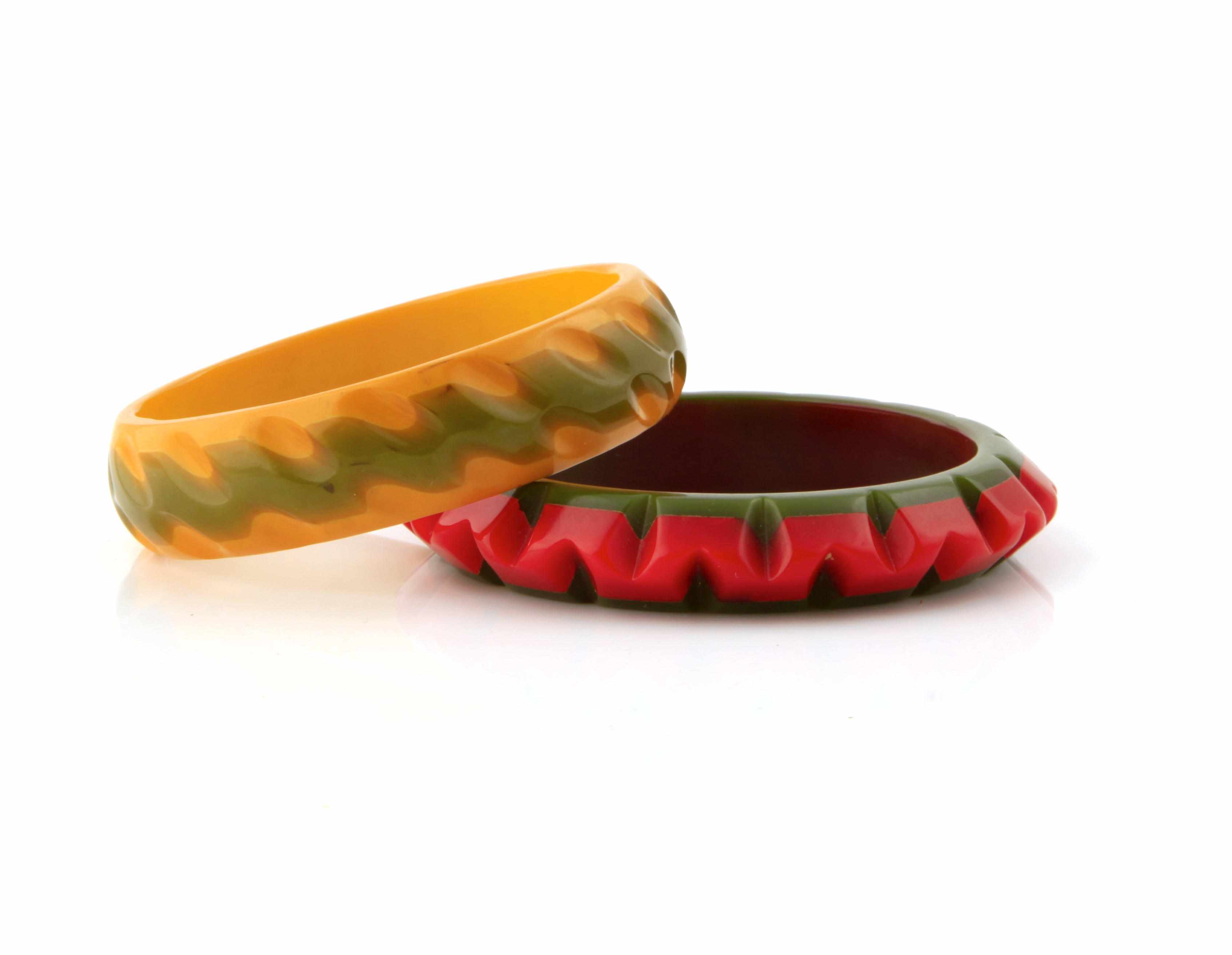 Appraisal: Twp carved and laminated Bakelite bangle bracelets each diameter in