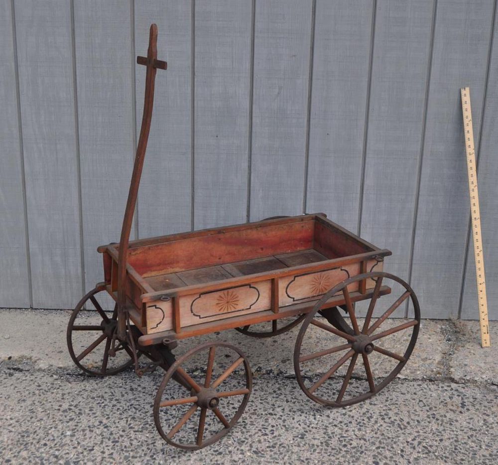 Appraisal: Antique Child's Painted Pull Wagon sides with folk art star