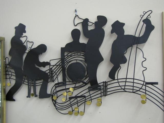 Appraisal: Two music-themed contemporary wall hangings metal and wire including one