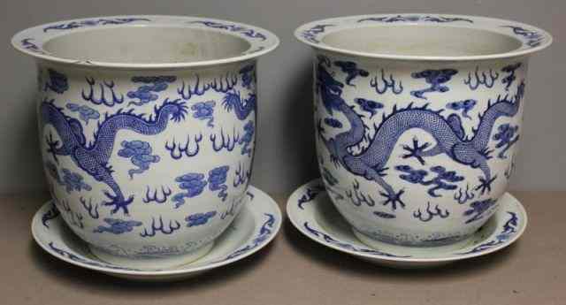 Appraisal: Pair of Asian Blue White Planters Under PlatesProbably th century