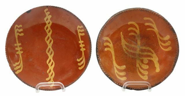 Appraisal: lot of American slip-decorated redware pottery plates th c having