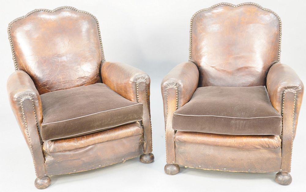 Appraisal: Pair of leather upholstered arm chairs with brass tacks and