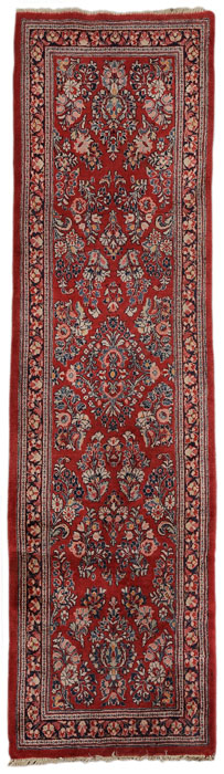 Appraisal: Sarouk Runner Persian late th century repeating floral bouquets on