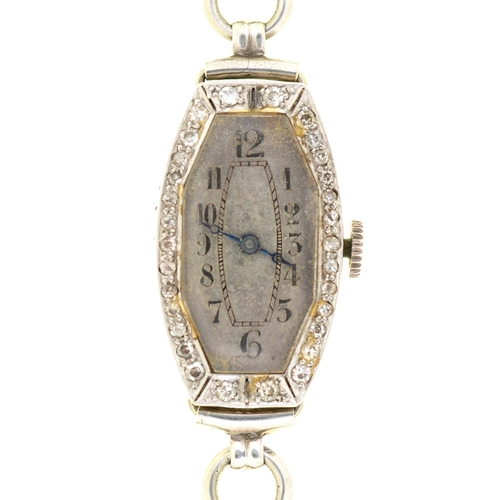 Appraisal: A diamond tonneau cocktail watch c with oval dial and