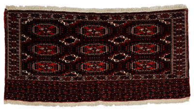 Appraisal: Tekke Turkmen Rug finely woven with rows of guls on