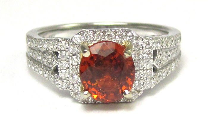 Appraisal: SPESSARTITE GARNET AND DIAMOND RING k white and yellow gold