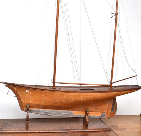 Appraisal: A DETAILED STATIC MODEL BOATwith detailed rigging raised on an