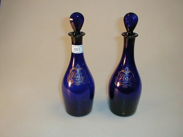 Appraisal: A pair of Bristol blue decanters tear-drop stoppers with gilt