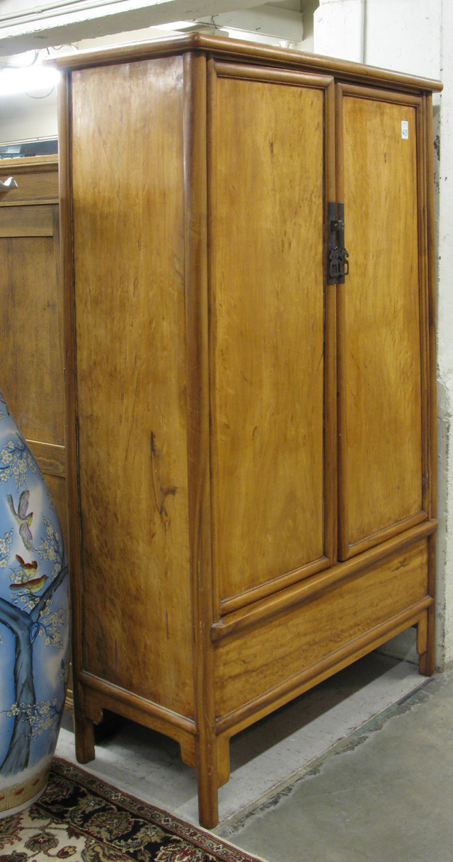 Appraisal: MING-STYLE JUMU ELM WOOD CABINET Chinese th century having a